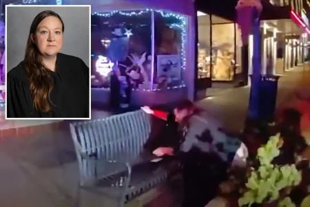 Drunk judge caught with her pants down peeing in public — as cops haul away interfering husband