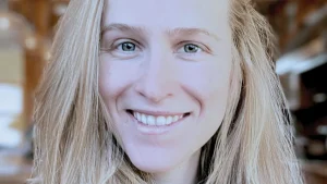 How did Pluto capture its largest moon, Charon?