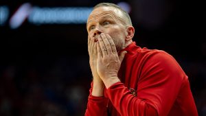 Louisville men’s basketball coach suffers bizarre injury trying to avoid celebration