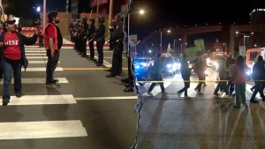LAX travelers abandon cars, walk to airport as protesters block building during Thanksgiving rush
