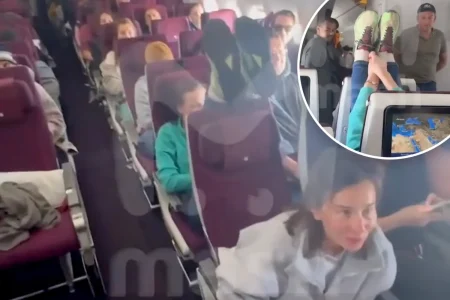Plane passenger stages temper tantrum by using neighbor’s seat as footrest: ‘People are going mad’