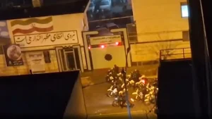 Armed Iran protesters battle police in Tehran streets as Trump warns of forceful US response