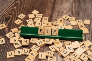 Crypto Lags Stock Rally as ETF Demand Cools