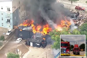 Large fire erupts at Dallas apartment complex and engulfs building