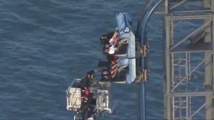 Eight riders left dangling atop 100-foot roller coaster for over three hours at Texas amusement park