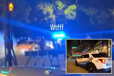 Chicago teen takeover mob rams police cruiser backward, swarms car as onlookers cheer: video