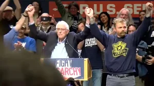 Maine Senate candidate Graham Platner embraces democratic socialism at Bernie Sanders rally in Portland