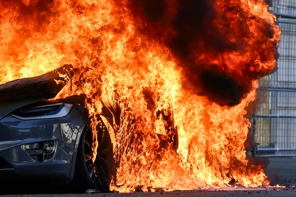 Tesla Torched as Thousands Protest G7 After Musk Milestone