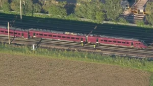 Two-train crash leaves at least 1 dead, 89 injured as emergency crews rush to chaotic scene