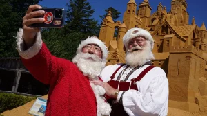 It’s Christmas in July as hundreds of Santas go on the march in the middle of a stifling summer heat wave
