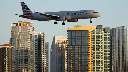 American Airlines flight lands safely after laptop battery catches fire on board; passenger injured