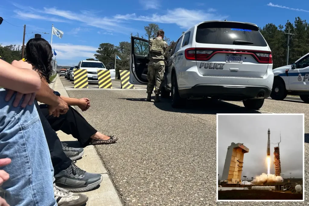 Reporters face guns and sirens after arriving for California Vandenberg Space Force event