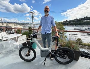 Rivian spinout Also lands in Seattle, with REI vet leading micromobility startup’s new office and retail hub