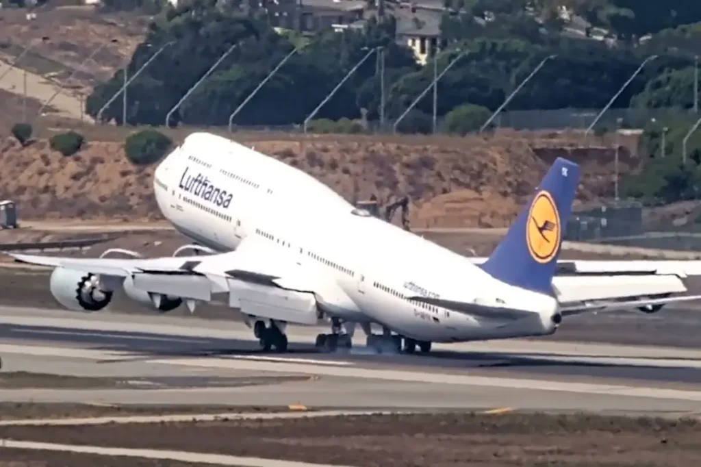 Terrifying moment massive Boeing 747 bounces off runway at LAX as tail scrapes ground