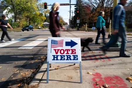 Democrats leading in ballots as early voting surges to midterms record